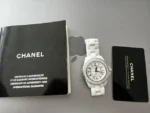 Montre CHANEL J12, lunette sertie de diamants, cadran blanc en céramique blanche, mouvement automatique, 38 mm