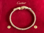 Bracelet Cartier Panthère Cougar Trinity en or jaune, blanc et rose 18 carats, service 2025 – Image 18