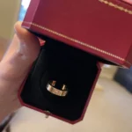 Bague Love classique Cartier avec 3 diamants en or jaune, taille 58