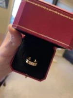 Bague Love classique Cartier avec 3 diamants en or jaune, taille 58