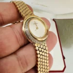 Montre Cartier Trinity pour femme, or jaune 18 carats et diamants ~ Boîte et papiers