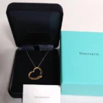 Collier pendentif cœur ouvert Tiffany & Co. 7 diamants Elsa Peretti or K18YG