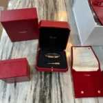 bracelet love cartier en or rose taille 17